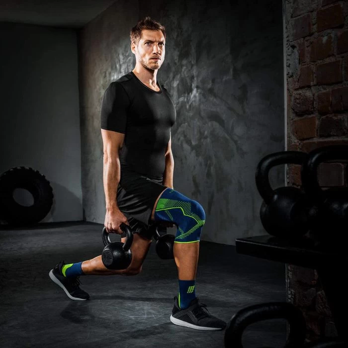 Medi Kniebandage Genumedi E+motion, Blau/grün, Mit Silikonring, Merino, Größe V – Bild 4